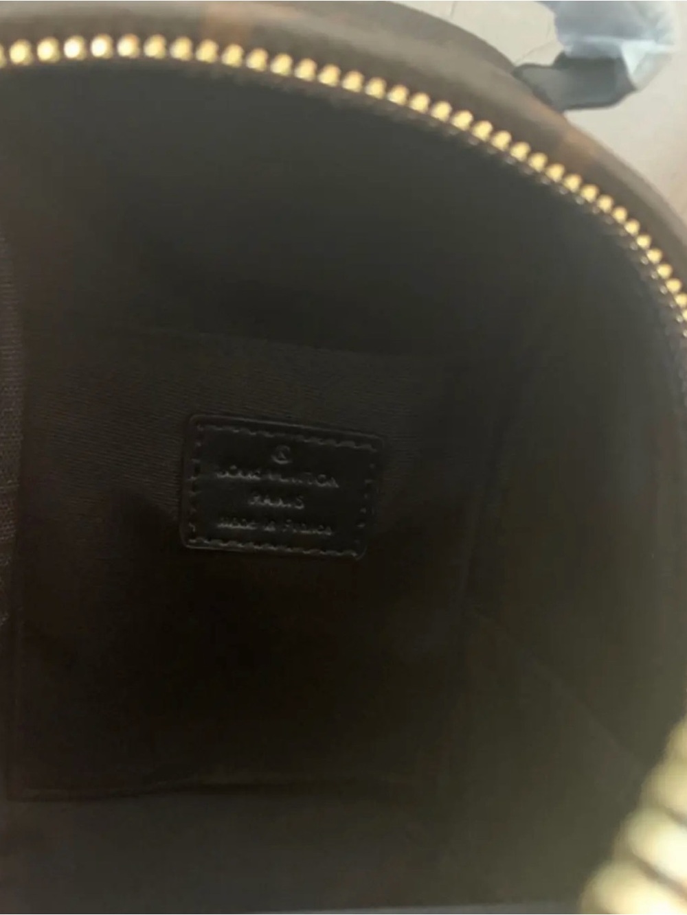 Brown Leather Backpack with Gold Zipper